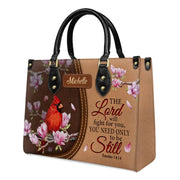 Lord Will Fight for You Exodus 14 14 Cardinal - Personalized Christian Handbag - Faith In My Bag is a brand operated by Gemini Clothing LLC